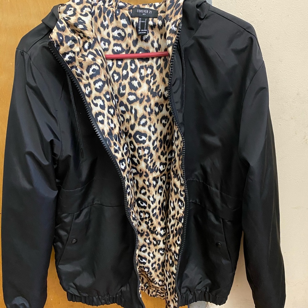 Black windbreaker